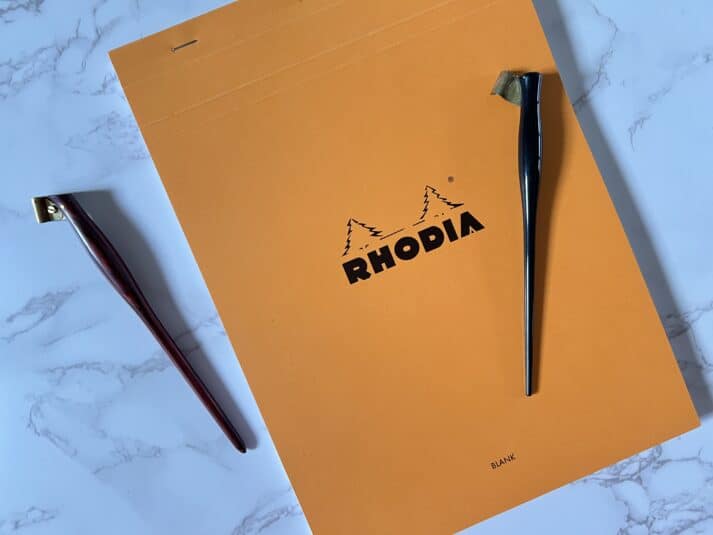 rhodia orange paper pad and 2 calligraphy pen holders