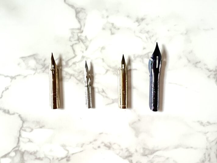 4 calligraphy nibs in a row