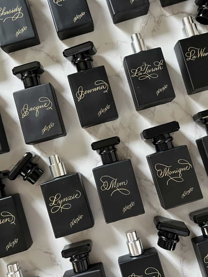 black perfume bottle calligraphy engraving